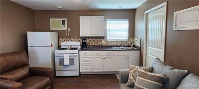 Full Kitchen with stove and refrigerator 