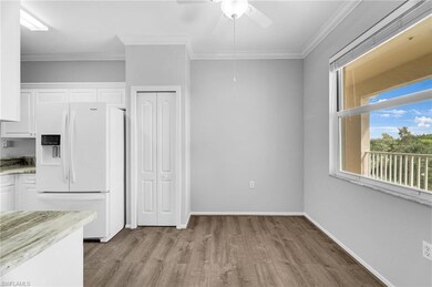 Unfurnished dining area featuring wood finished fl