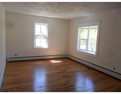 Living Room. FRESHLY FINISHED HARDWOODS WITH BEAUT