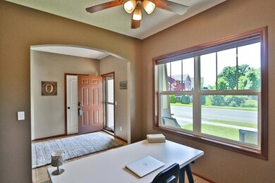 The main level office/study features a large open 