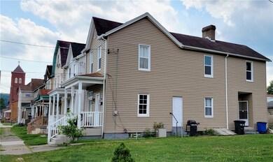 Side view of house on quiet street