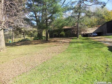 Exterior Front. Front view including barn and gara