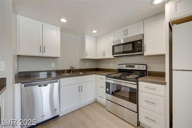 Kitchen featuring appliances with stainless steel