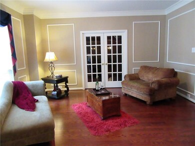 formal Living with double doors into Study