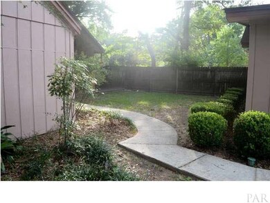 Side yard, with view of yard building to the left