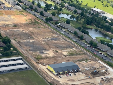 Grand Slam Business Park is a premier mixed-use development in Fort Smith. 17.72 acres, the property offers three 1.1-acre lots, 12 flexible buildings, fiber-optic connectivity, LED signage, and new road access with 20,000+ daily vehicle exposure. Projected returns include $1.836M annual rental income, $1M+ lot sales, and a 15.3% ROI. With proximity to Fort Smith Regional Airport and regional growth fueled by military expansion, this is a rare investment opportunity.