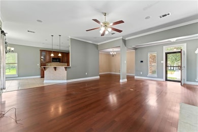 Living room opens to Dining Room