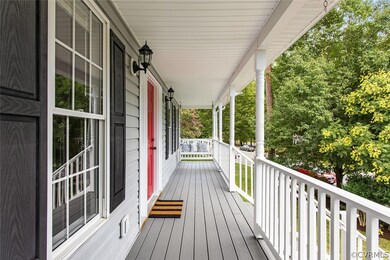 Maintenance free full front porch is an oasis with