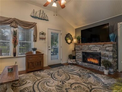 Beautiful Stone Fireplace with Gas Logs