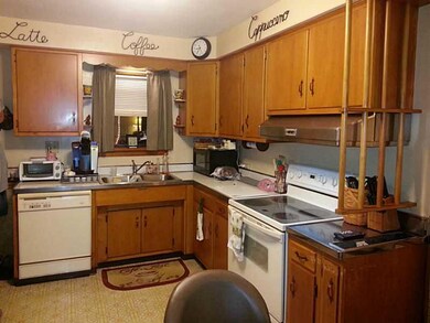 Kitchen. Plenty of cabinets, including a pantry!