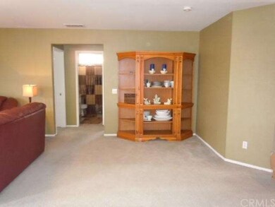The family room has an extended area...add the tre