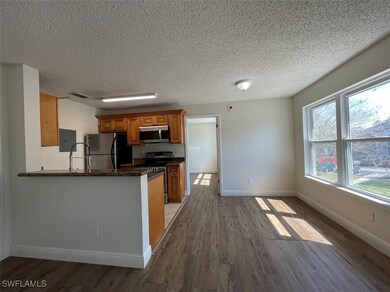 Kitchen featuring stainless steel appliances, brow