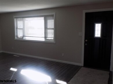 Large Living room, home features newer windows, so