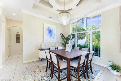 Dining space featuring crown molding and a wealth of natural light