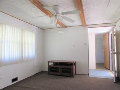 Living room has space for multiple seating options