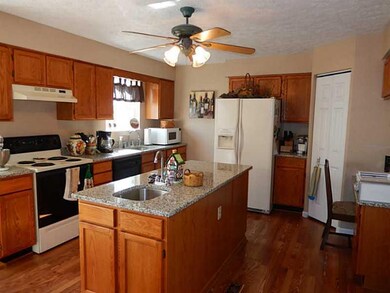 Kitchen. Island kitchen with granite counters and 
