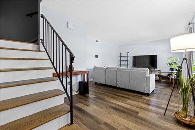 Living room featuring dark hardwood / wood-style f