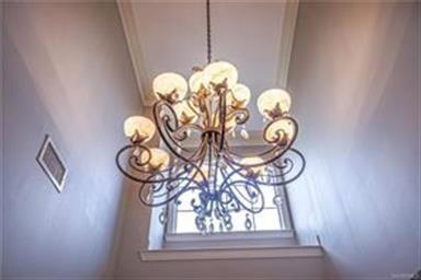 Grand entry foyer with high ceilings