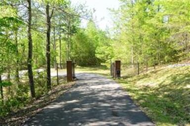 PRIVATE GATED ENTRY & FULL PAVED DRIVEWAY TO THE E