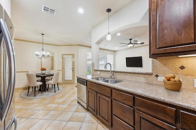 Kitchen with a sink, appliances with stainless st
