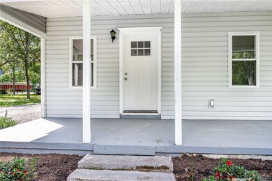 Exterior view, 22X7 front porch and entrance to ho
