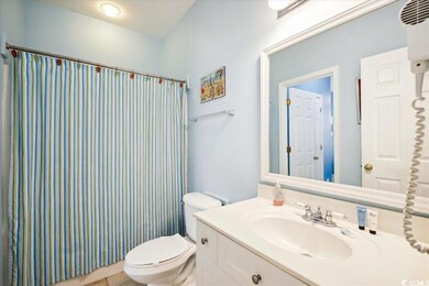 Full bathroom with vanity and toilet