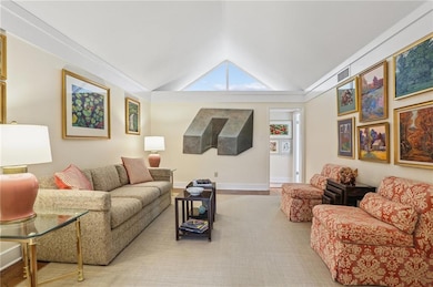 This marvelous living room with cathedral ceiling