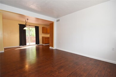 Large, open concept floorplan leads into the dinin