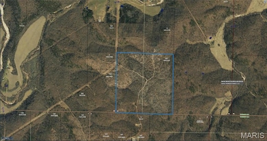 Aerial map of property and surrounding area with property boundaries highlighted
