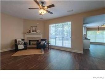 Great room features a wide style plank flooring, h