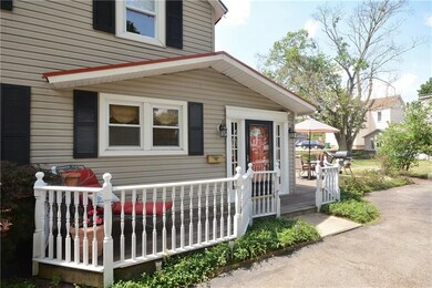Very inviting front porch / door leads into the mo
