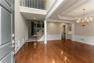 2381 Briarleigh Way~  The welcoming view when you arrive home! A two story Foyer immediately greets you and just ahead is the dramatic two story Great Room. To the right is the oversized Dining Room.