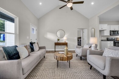 STATEMENT MAKING Great Room w/ Cathedral Ceiling
