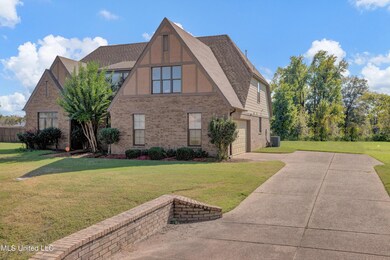 View of home and driveway
