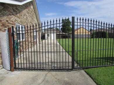 driveway entrance; notice the vacant lot shown on