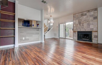 Unfurnished living room featuring visible vents, 