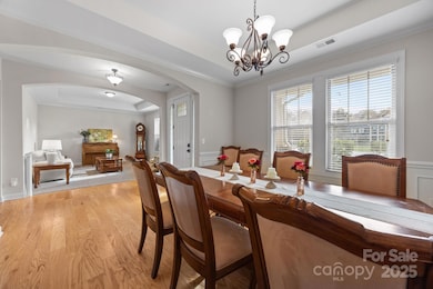 Host guests in your generous and light filled dining room