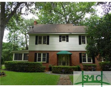 Exterior Front. BEAUTIFUL FRONT YARD AND INVITING 
