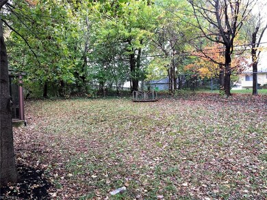 The back yard has plenty of room for family fun ti
