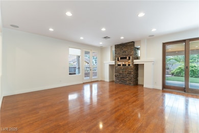 Great room with  recessed lighting, baseboards, wo