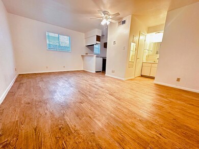 Unfurnished living room featuring light wood-type