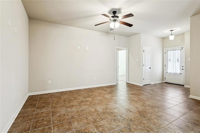 Great Room: Tile Flooring - Ceiling Fan - Coat Closet