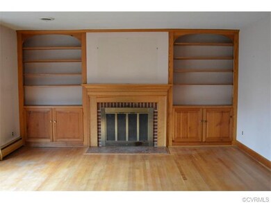 Living room with built-insand fireplace gets great