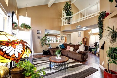 High vaulted ceiling living room, wood laminate fl