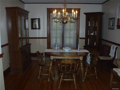 Dining Room with Hardwood Floors and Original Fren