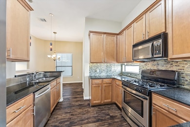 You are going to love cooking in this kitchen! Stainless appliances and plenty of counter space to prep your favorite meals plus ample storage!