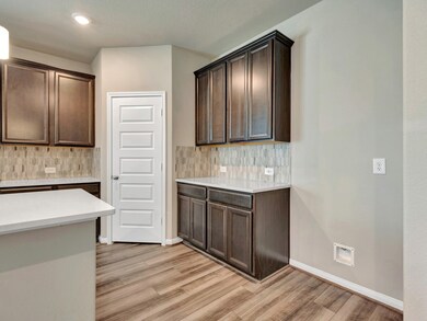 Photo is not of the actual home, but is an inspirational photo of builder’s model home and may depict options, furnishings, and/or decorator features that are not included