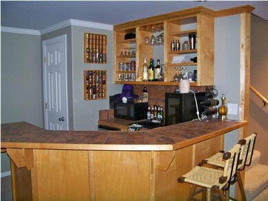 Wet bar in finished family room in basement