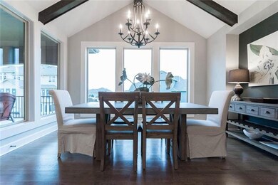Dining Room Features Hardwood Floors, Vaulted Ceil
