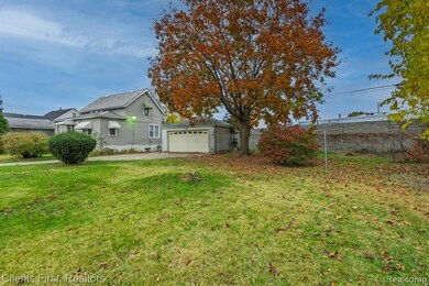 View of home's exterior featuring a garage
